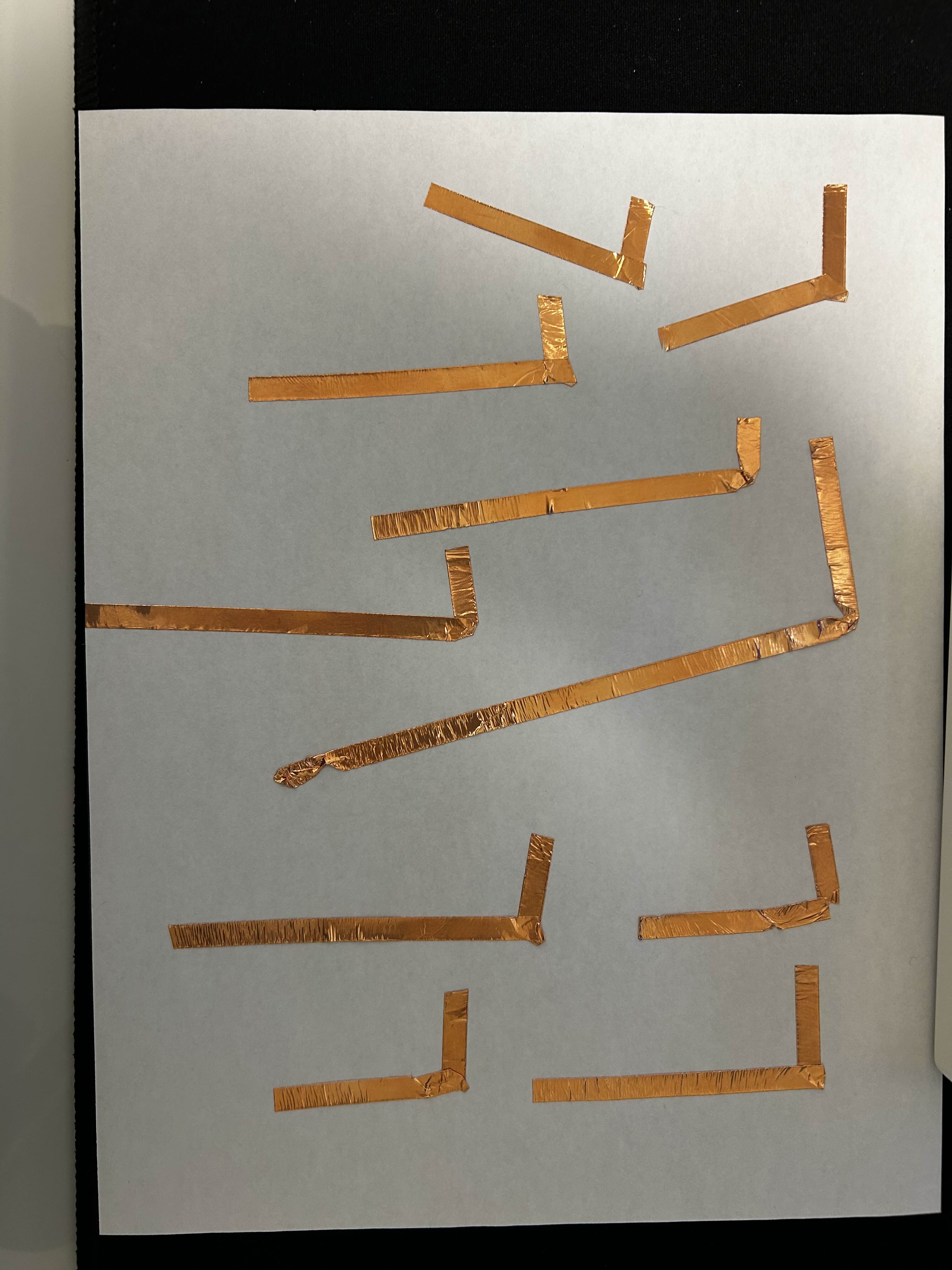 practicing how to turn the copper tape